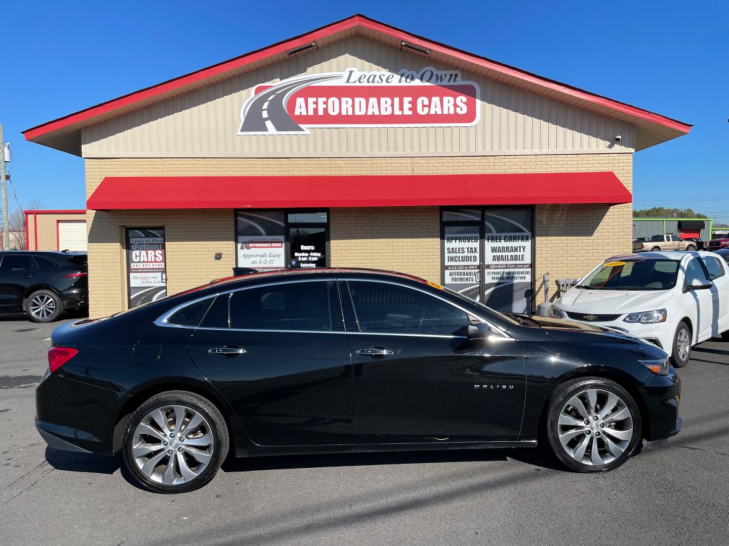 2017 Black Chevrolet Malibu (1G1ZH5SX0HF) with an 4-Cyl, Turbo, 2.0 Liter engine, Automatic, 9-Spd transmission, located at 8008 Warden Rd, Sherwood, AR, 72120, (501) 801-6100, 34.830078, -92.186684 - Photo#0